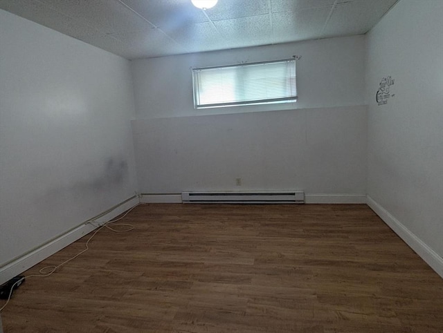 300 Smithfield Rd Unit 2-2, North Providence, RI 02904 - spare room with a baseboard radiator, wood finished floors, and baseboards