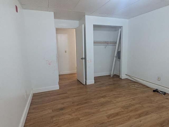 300 Smithfield Rd Unit 2-2, North Providence, RI 02904 - unfurnished bedroom featuring wood finished floors, baseboards, and a closet
