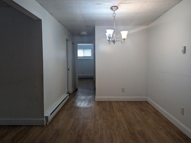 300 Smithfield Rd Unit 2-2, North Providence, RI 02904 - unfurnished dining area with baseboard heating, a chandelier, wood finished floors, and baseboards