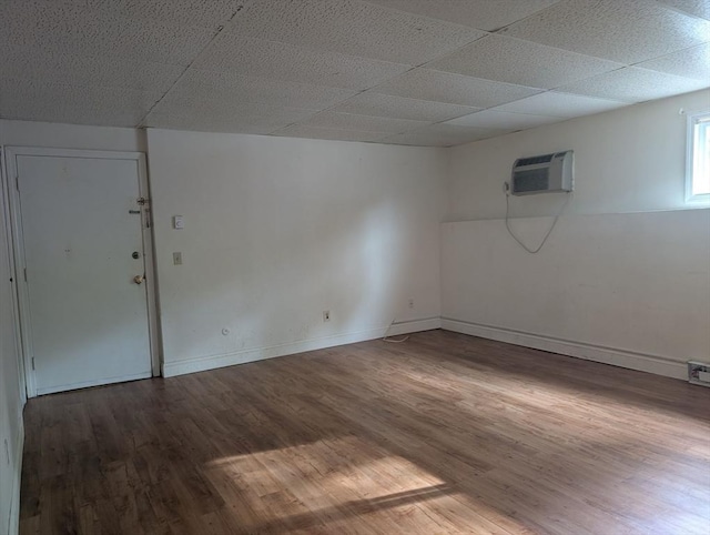 300 Smithfield Rd Unit 2-2, North Providence, RI 02904 - spare room featuring a wall mounted AC, wood finished floors, and baseboards