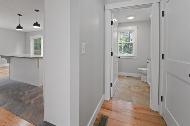 21 Stephanie St Unit 1, Gardner, MA 01440 - hallway with baseboards and healthy amount of natural light