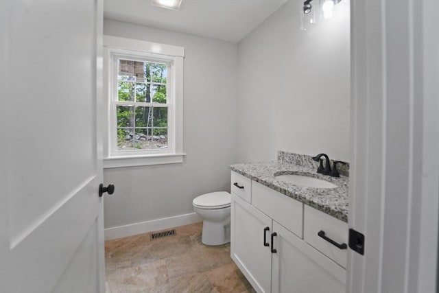 21 Stephanie St Unit 1, Gardner, MA 01440 - half bath featuring vanity, baseboards, and toilet
