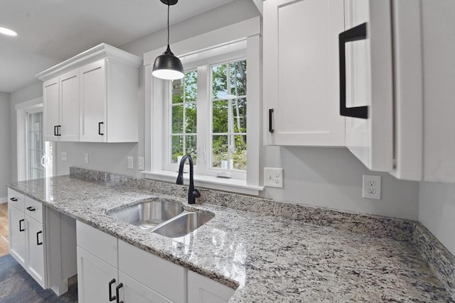 21 Stephanie St Unit 1, Gardner, MA 01440 - kitchen with a sink, white cabinets, pendant lighting, light stone counters, and recessed lighting