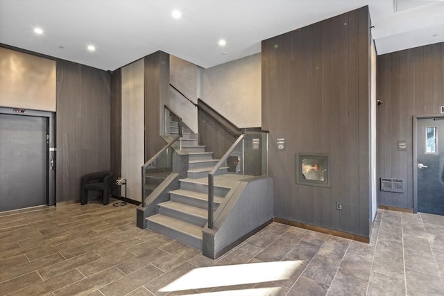340 W 2nd St Unit 23, Boston, MA 02127 - stairway with wooden walls and recessed lighting