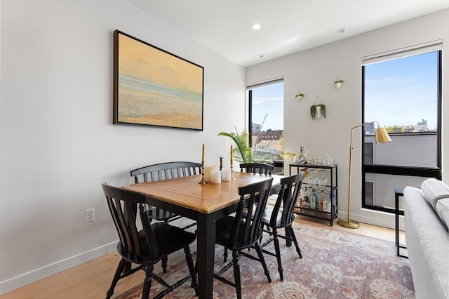 340 W 2nd St Unit 23, Boston, MA 02127 - dining area featuring baseboards, light wood-style floors, and recessed lighting