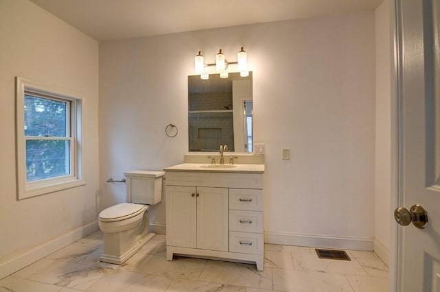 full bath with an enclosed shower, baseboards, vanity, toilet, and marble finish floor