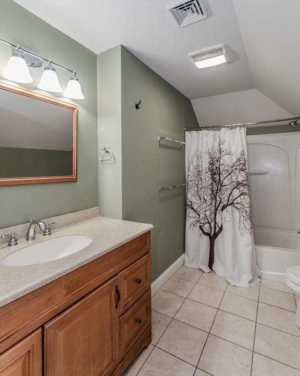 bathroom with vanity, visible vents, vaulted ceiling, tile patterned floors, and shower / bathtub combination with curtain