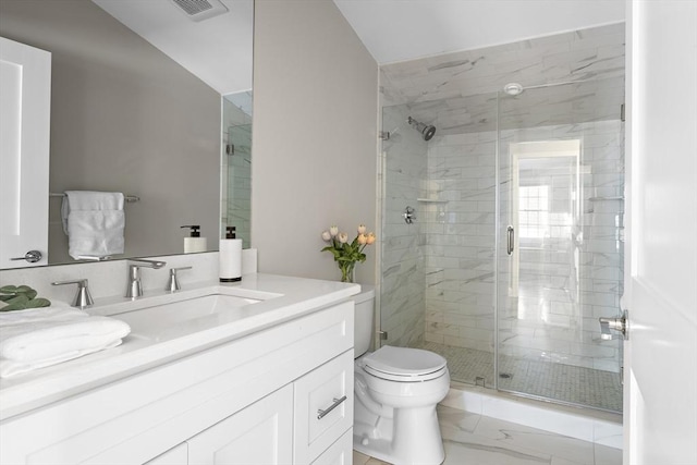 bathroom with toilet, lofted ceiling, vanity, and a shower with shower door