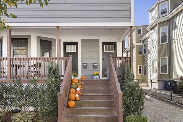 doorway to property with a porch