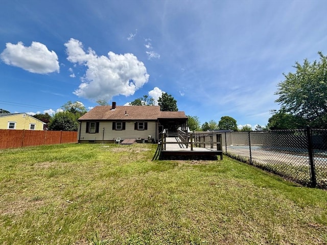20 Birch St, Acushnet, MA 02743 - back of house with crawl space and a deck