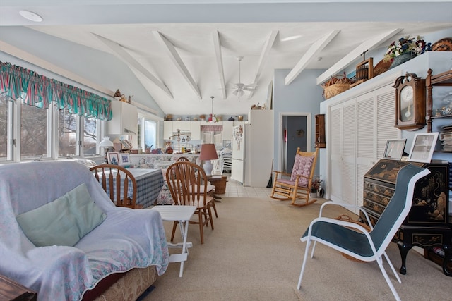 carpeted living room with ceiling fan and vaulted ceiling with beams