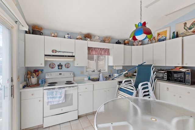 kitchen featuring white cabinets, light tile patterned floors, sink, and electric range