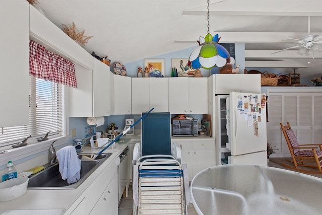 kitchen with sink, dishwasher, white fridge, ceiling fan, and white cabinets