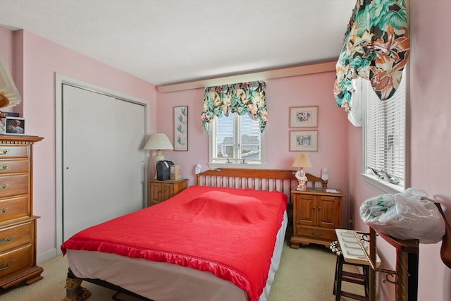 bedroom featuring a closet and carpet