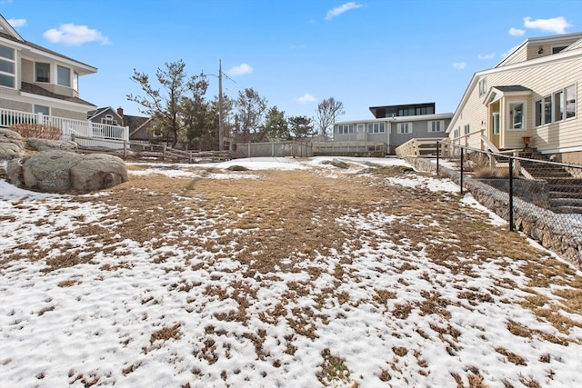 view of yard covered in snow