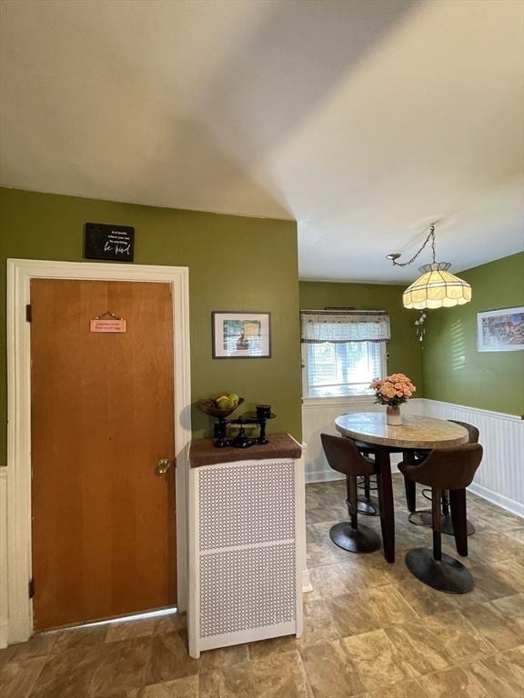 27 Springvale Ave, Lynn, MA 01904 - dining area with wainscoting and stone finish flooring