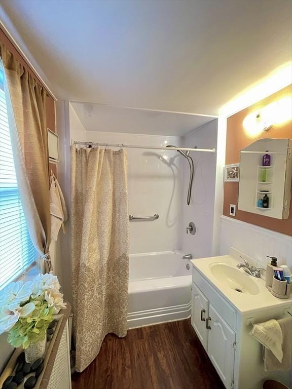 27 Springvale Ave, Lynn, MA 01904 - full bathroom with wood finished floors, vanity, and shower / tub combo
