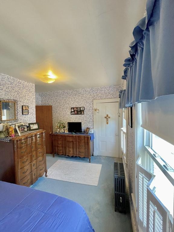 27 Springvale Ave, Lynn, MA 01904 - carpeted bedroom with wallpapered walls