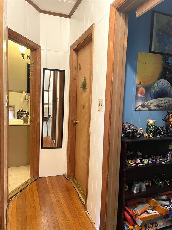 27 Springvale Ave, Lynn, MA 01904 - hallway featuring light wood-style flooring and crown molding