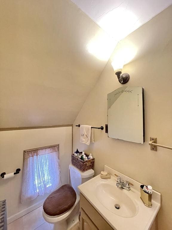 27 Springvale Ave, Lynn, MA 01904 - half bath with lofted ceiling, vanity, and toilet