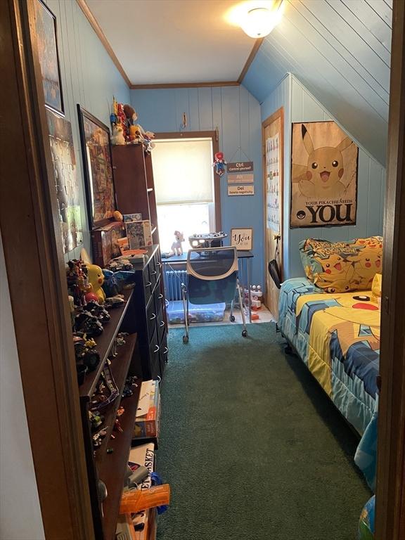 27 Springvale Ave, Lynn, MA 01904 - bedroom featuring carpet, lofted ceiling, and crown molding