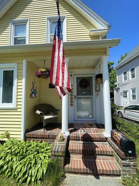 27 Springvale Ave, Lynn, MA 01904 - doorway to property featuring a porch
