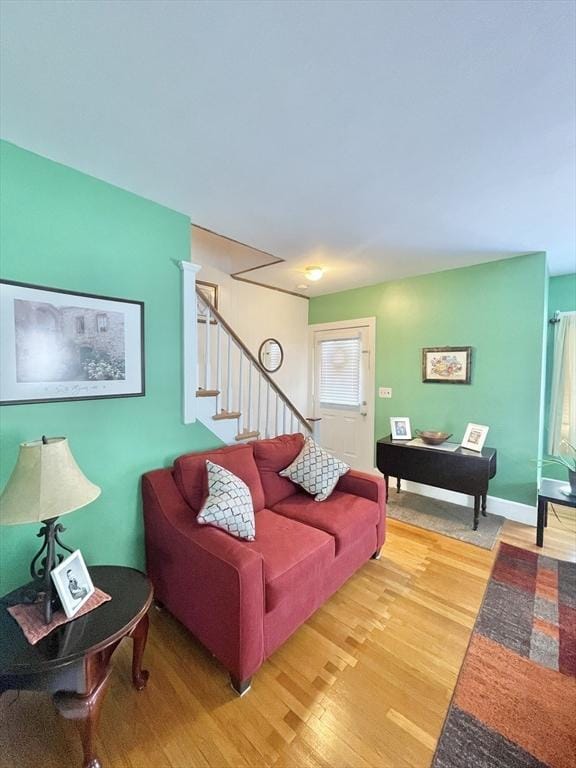 27 Springvale Ave, Lynn, MA 01904 - living area featuring light wood-style flooring and stairs