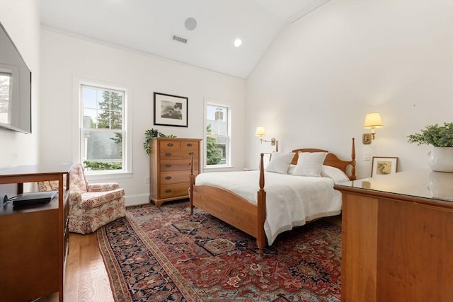 101 Waban St Unit 101, Newton, MA 02458 - bedroom featuring wood finished floors, baseboards, recessed lighting, and high vaulted ceiling