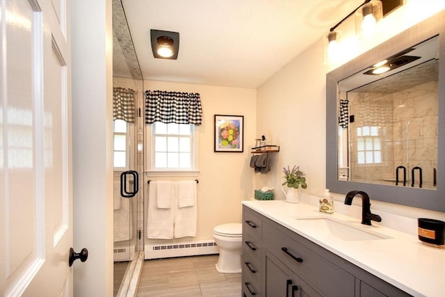 21 Flintlock Ridge Rd, Cohasset, MA 02025 - full bath featuring baseboard heating, vanity, and a stall shower
