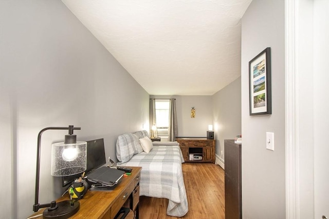 21 Flintlock Ridge Rd, Cohasset, MA 02025 - bedroom featuring wood finished floors and baseboard heating