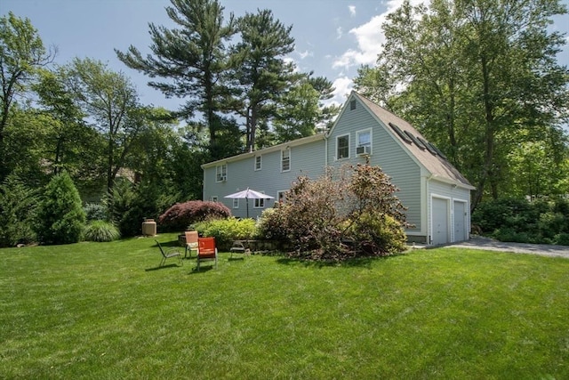 21 Flintlock Ridge Rd, Cohasset, MA 02025 - view of home's exterior featuring a lawn and driveway