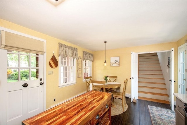 21 Flintlock Ridge Rd, Cohasset, MA 02025 - dining room with dark wood finished floors and stairway
