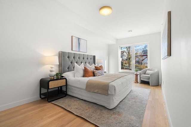 bedroom featuring hardwood / wood-style flooring