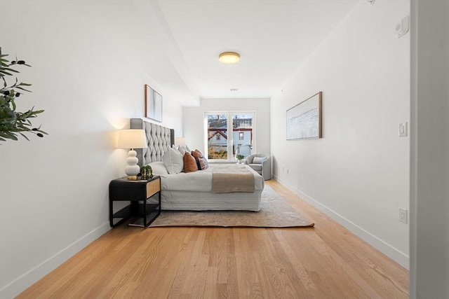 bedroom with light hardwood / wood-style flooring