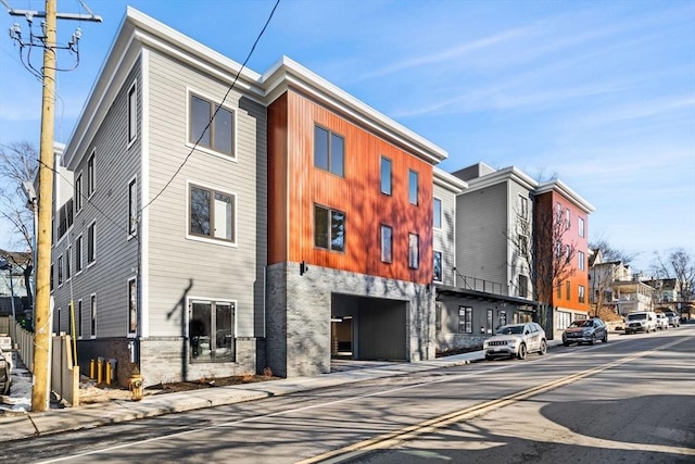 view of building exterior featuring a garage