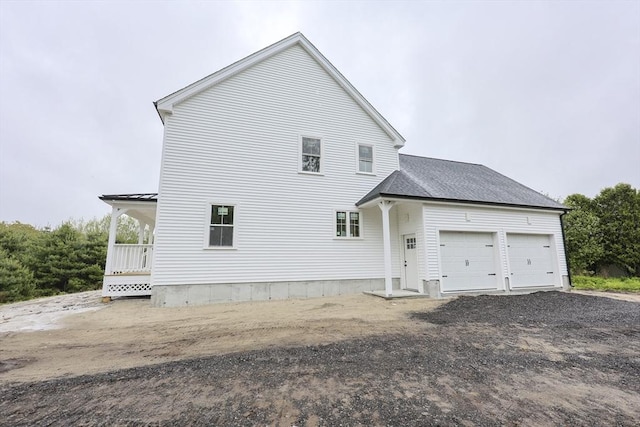 38 Hemlock St, Douglas, MA 01516 - rear view of property with a garage and roof with shingles