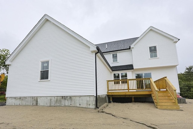 38 Hemlock St, Douglas, MA 01516 - back of property with a wooden deck and a shingled roof