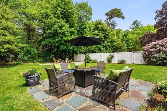 view of patio / terrace featuring a fire pit