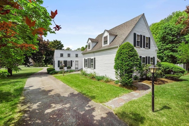 view of front of home with a front yard