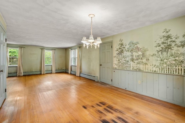 35 Chapin Rd, Holden, MA 01520 - unfurnished room with a chandelier and wood-type flooring