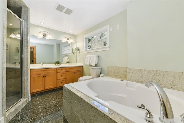 full bathroom featuring double vanity, toilet, a garden tub, a shower stall, and recessed lighting