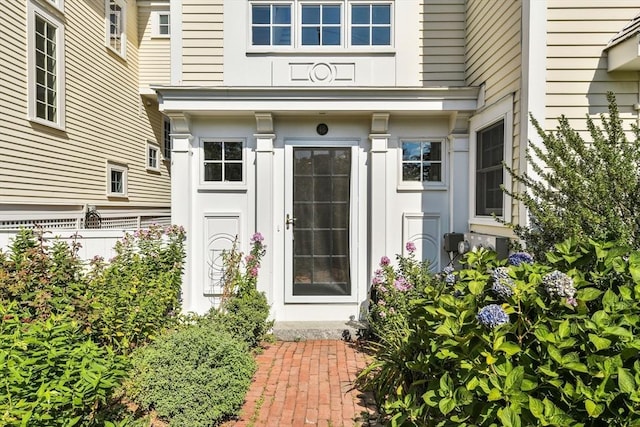 property entrance featuring fence