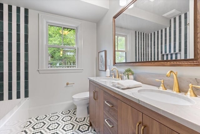197 Winchester St Unit 197, Brookline, MA 02446 - full bathroom with plenty of natural light, toilet, double vanity, and tile patterned floors