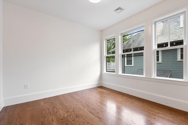 197 Winchester St Unit 197, Brookline, MA 02446 - spare room with baseboards and wood finished floors