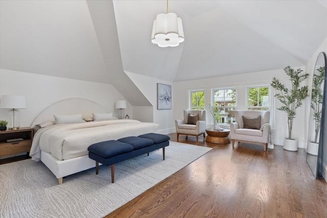 197 Winchester St Unit 197, Brookline, MA 02446 - bedroom with wood finished floors, high vaulted ceiling, and baseboards
