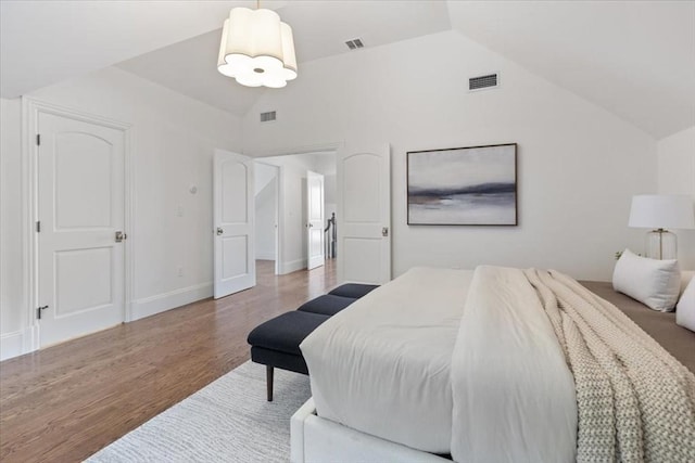 197 Winchester St Unit 197, Brookline, MA 02446 - bedroom with lofted ceiling and wood finished floors