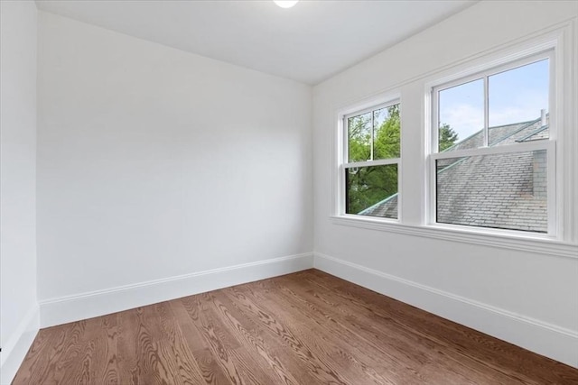 197 Winchester St Unit 197, Brookline, MA 02446 - empty room featuring baseboards and wood finished floors