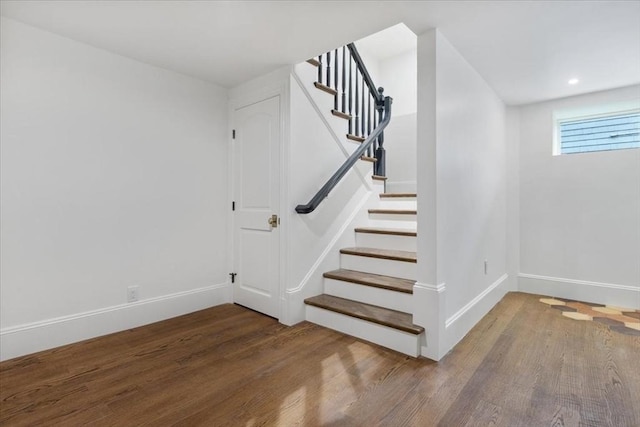 197 Winchester St Unit 197, Brookline, MA 02446 - staircase featuring wood finished floors, baseboards, and recessed lighting