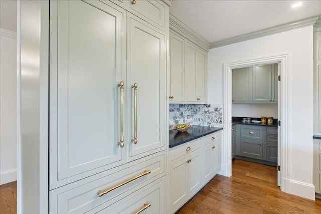 197 Winchester St Unit 197, Brookline, MA 02446 - bar with dark wood-style flooring and ornamental molding