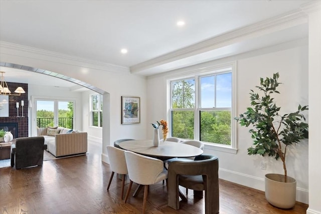 197 Winchester St Unit 197, Brookline, MA 02446 - dining area featuring plenty of natural light, ornamental molding, baseboards, wood finished floors, and recessed lighting